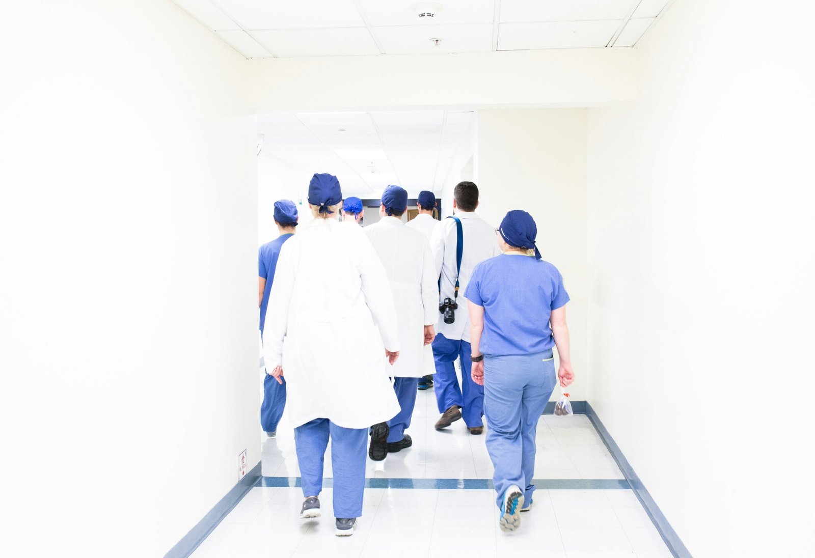 Understanding Cpa In Medical Terms: What You Need To Know Group Of Doctors Walking On Hospital Hallway